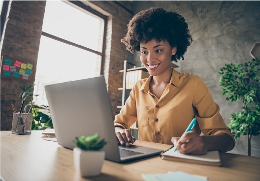 woman working on her laptop