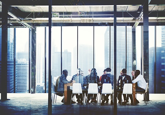 colleagues sitting in a boardroom