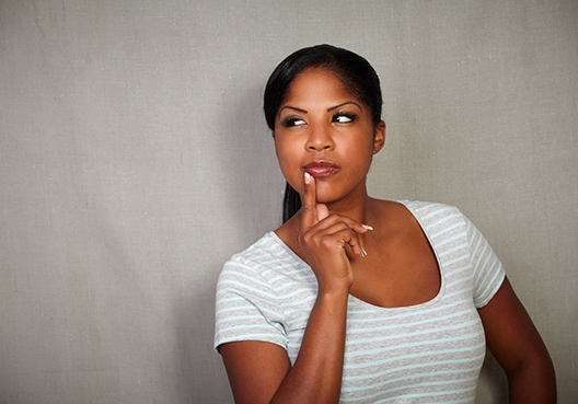 woman sitting in thought
