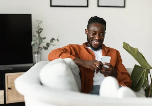 man holding mobile phone 