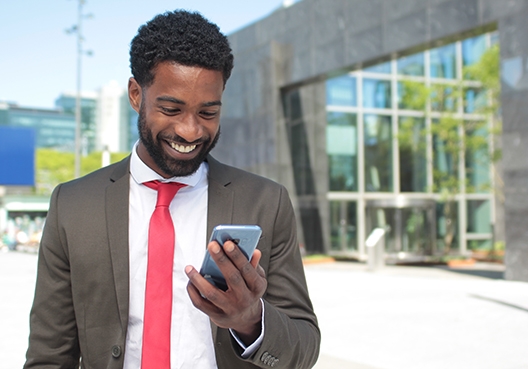 man looking at his cellphone