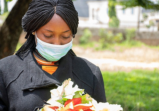 woman holding a bouquet of flowers
