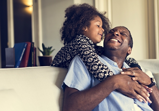 daughter hugging her dad