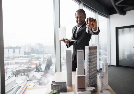 man holds property keys