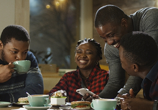 group of friends having coffee together