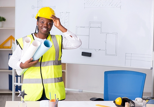 contractor standing in front of a whiteboard