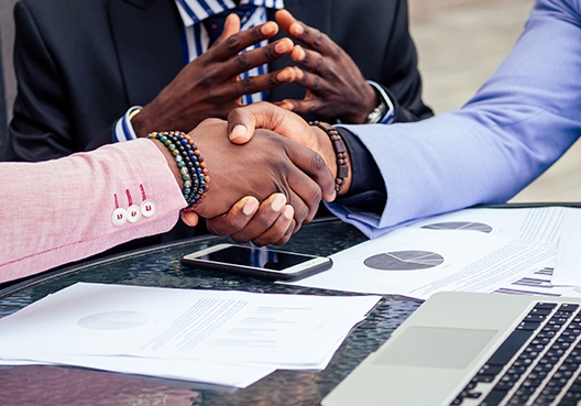 two people shaking hands
